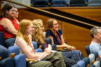 Audience response to Round 3 funding shout-out from Shitij Kapur – Roxanne Keynejad looking pleased – with Rachel Gibson (Root To Tip) smiling next to her & Elena, Rhiannon and Sarah Trepiccione (NMES